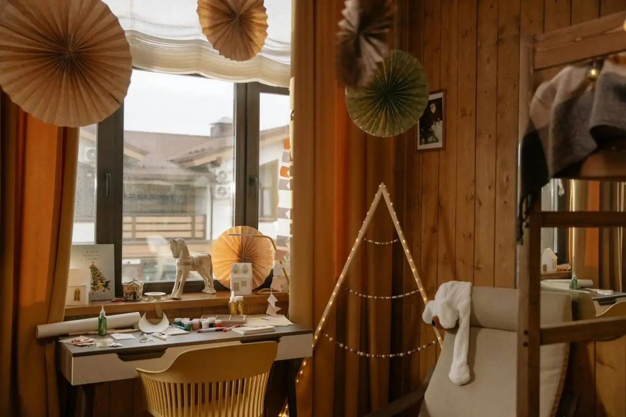 Warm wooden room interior featuring creative decor elements and natural light.